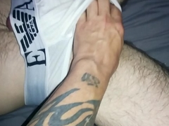 Dispirited massage wide of tattooed man to his bi side